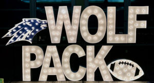 lighted sign that says Wolf Pack